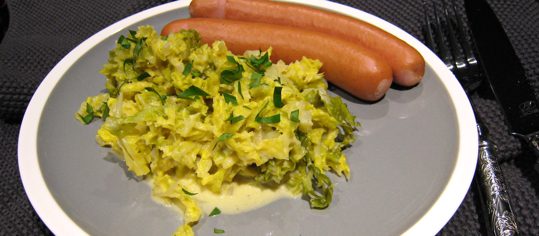 Wirz an Senfrahmsauce mit Wienerli